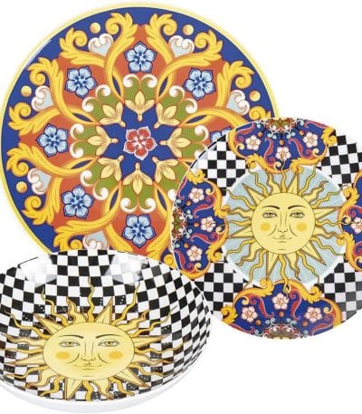 a group of plates with a sun design